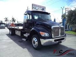 Low Profile Flatbed Towing business image